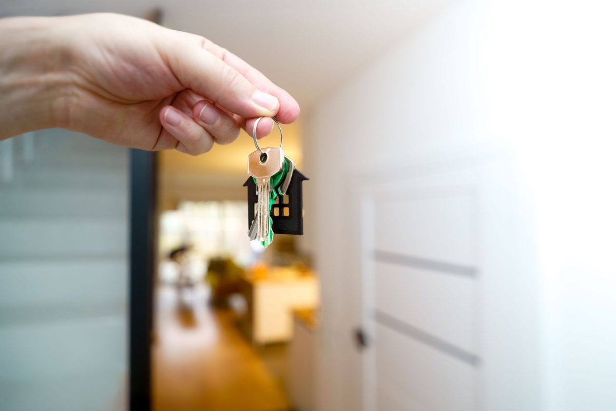 property management photo with keys in front of door